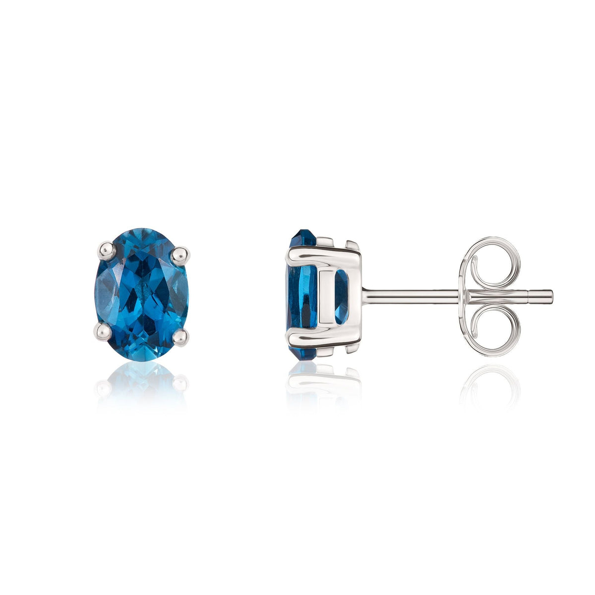 9ct White Gold Oval Natural London Blue Topaz Claw Stud Earrings — 7x5mm