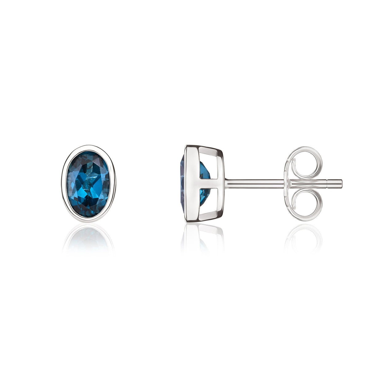 9ct White Gold Oval Natural London Blue Topaz Rubover Stud Earrings — 6x4mm