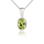 9ct White Gold Oval Natural Peridot Rubover Pendant — 6x4mm