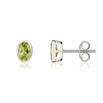 9ct White Gold Oval Natural Peridot Rubover Stud Earrings — 6x4mm