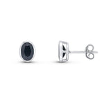9ct White Gold Oval Natural Sapphire Rubover Stud Earrings — 7x5mm
