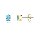 9ct Yellow Gold Oval Natural Swiss Blue Topaz Claw Set Stud Earrings — 6x4mm