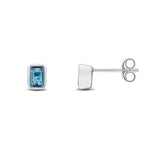 9ct White Gold Octagonal Emerald Cut Natural London Blue Topaz Rubover Stud Earrings — 5x3mm