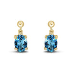 9ct Yellow Gold Oval Natural London Blue Topaz Claw Drop Earrings — 7x5mm