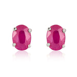 9ct White Gold Oval Natural Ruby Claw Stud Earrings — 7x5mm