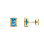 9ct Yellow Gold Octagonal Emerald Cut Natural Swiss Blue Topaz Rubover Stud Earrings — 7x5mm