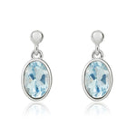 9ct White Gold Oval Natural Aquamarine Rubover Drop Earrings — 7x5mm