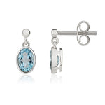 9ct White Gold Oval Natural Swiss Blue Topaz Rubover Drop Earrings — 6x4mm