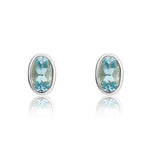 9ct White Gold Oval Natural Aquamarine Rubover Stud Earrings — 5x3mm