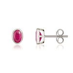 9ct White Gold Oval Natural Ruby Rubover Stud Earrings — 6x4mm