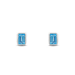 9ct White Gold Octagonal Emerald Cut Natural Swiss Blue Topaz Rubover Stud Earrings — 5x3mm
