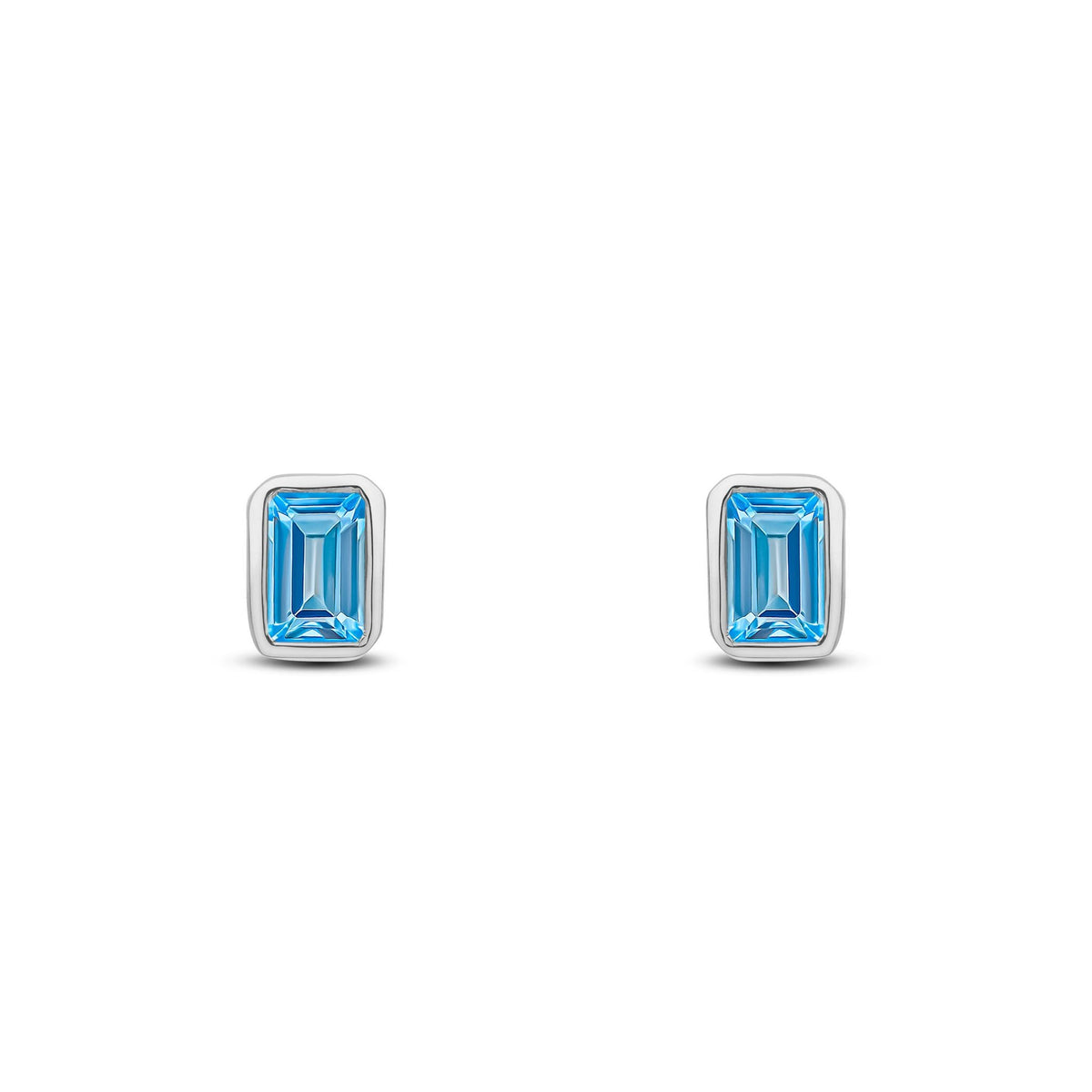 9ct White Gold Octagonal Emerald Cut Natural Swiss Blue Topaz Rubover Stud Earrings — 5x3mm