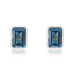 9ct White Gold Octagonal Emerald Cut Natural London Blue Topaz Rubover Stud Earrings — 7x5mm