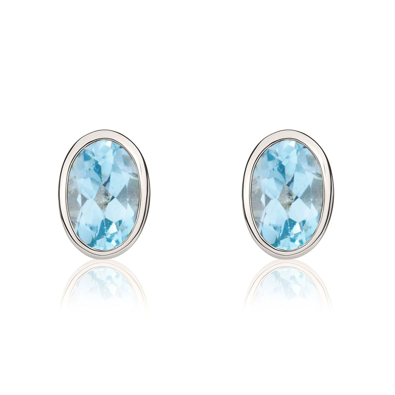 9ct White Gold Oval Natural Swiss Blue Topaz Rubover Stud Earrings — 6x4mm