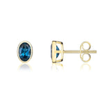 9ct Yellow Gold Oval Natural London Blue Topaz Rubover Stud Earrings — 6x4mm