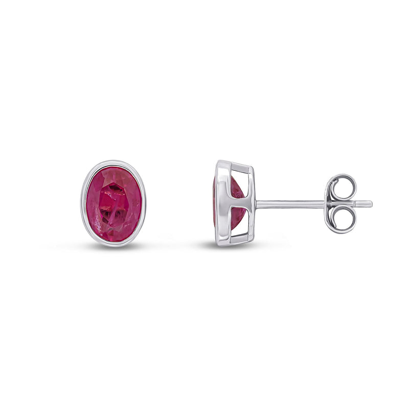 9ct White Gold Oval Natural Ruby Rubover Stud Earrings — 7x5mm