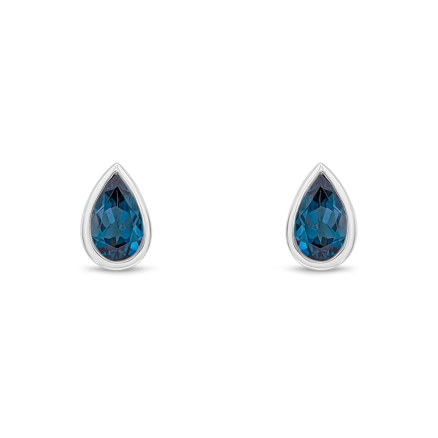 9ct White Gold Pear Shaped Natural London Blue Topaz Rubover Stud Earrings — 5x3mm