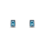 9ct White Gold Octagonal Emerald Cut Natural London Blue Topaz Rubover Stud Earrings — 5x3mm