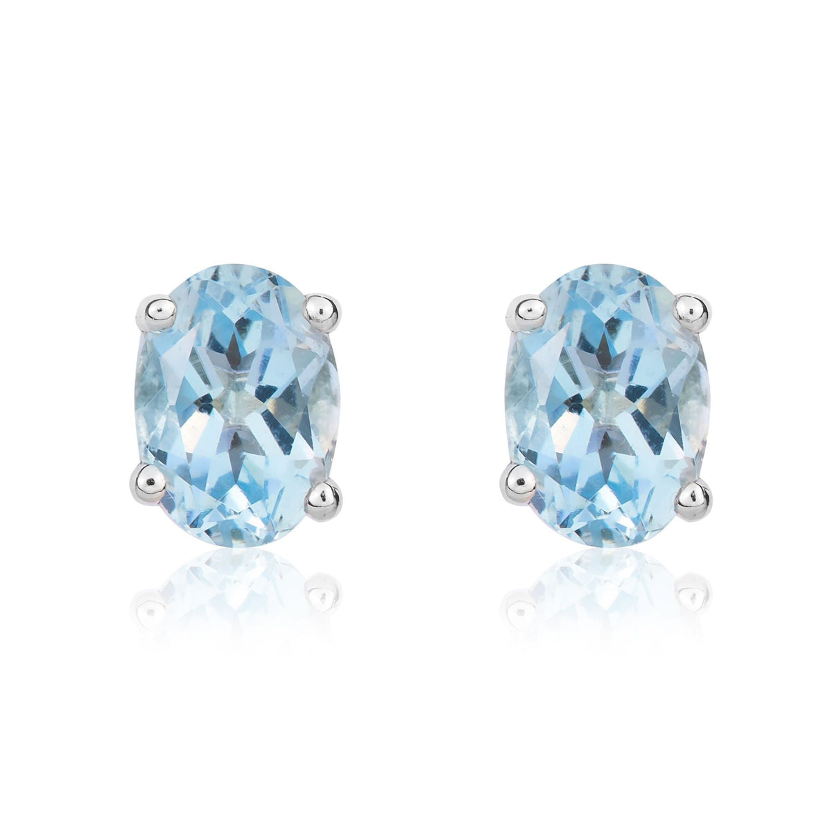9ct White Gold Oval Natural Aquamarine Claw Stud Earrings — 7x5mm