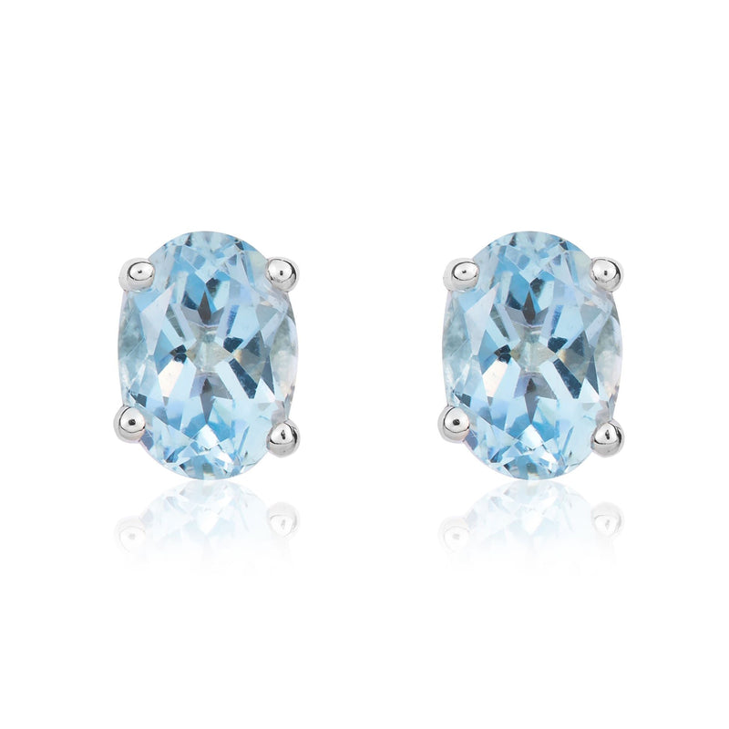 9ct White Gold Oval Natural Aquamarine Claw Stud Earrings — 7x5mm