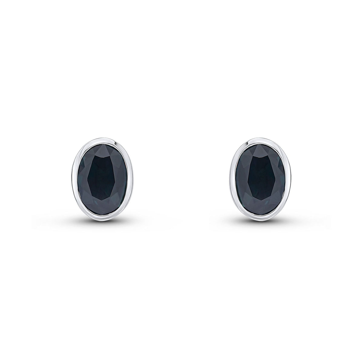 9ct White Gold Oval Natural Sapphire Rubover Stud Earrings — 7x5mm